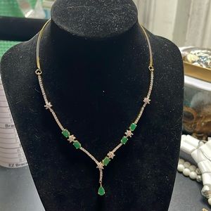 two-tone necklace with simulated emerald and cubic zirconia
